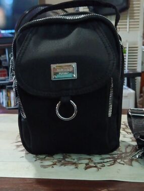 Compact Black Women's Belt Bag with Silver Ring Accent